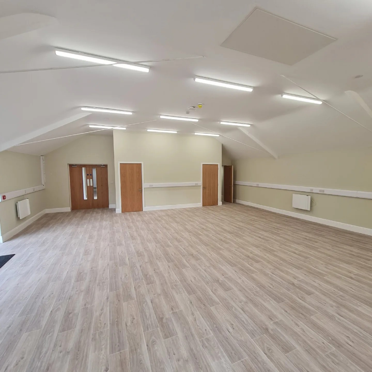 Large interior hall redecorated with painted walls and white woodwork, Hillgrove House, Bangor