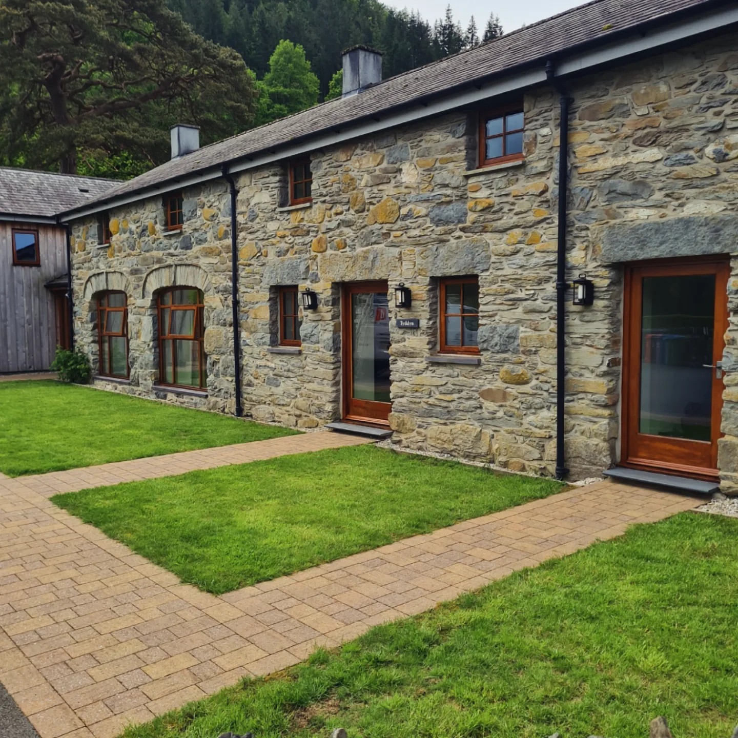Hendre Rhys Gethin Lodges, Betws-y-Coed Finished oak windows and doors at Hendre Rhys Gethin Lodges, Betws-y-Coed, stained in Medium Oak