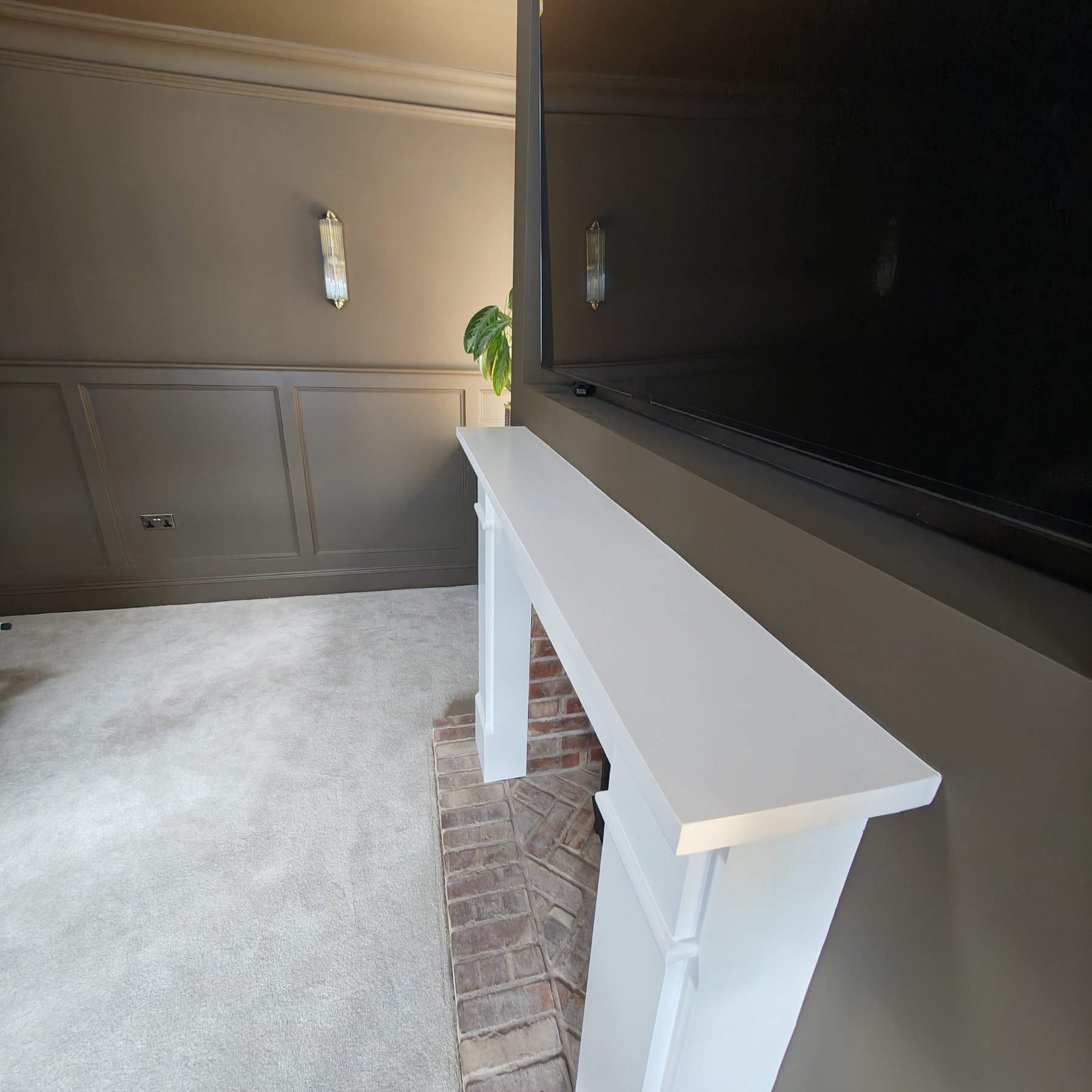 White painted fireplace surround and brick hearth, Penrhyn Bay living room