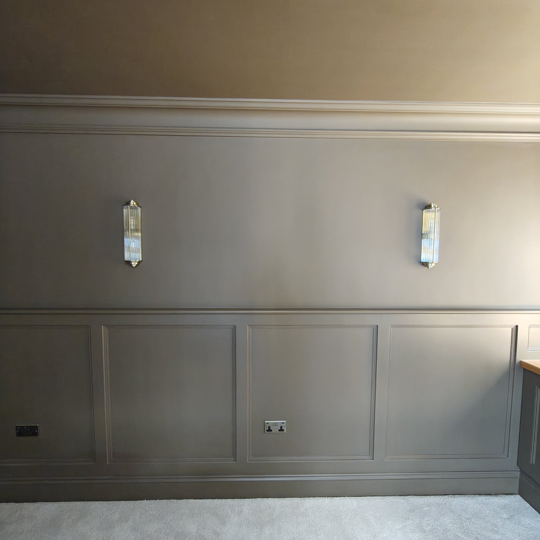 Painted wall panelling and sconce lights, living room decorating, Penrhyn Bay